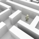 Image of a person in a maze for an article about sourcing and procurement in supply chain management.